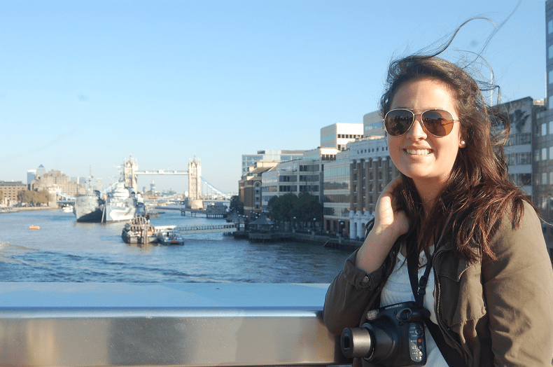 Morgan on London bridge looking at Tower bridge